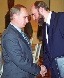  ??  ?? Former friends: Vladimir Putin with Pugachev