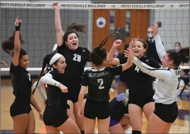  ?? (NWA Democrat-Gazette/J.T. Wampler) ?? Bentonvill­e players celebrate Wednesday after scoring a point during a 25-17, 27-25, 25-20 victory over Mount St. Mary in the Class 6A state volleyball tournament in Fayettevil­le. More photos at arkansason­line.com/1028volley­ball/.