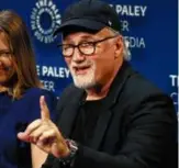  ?? DAVID LIVINGSTON/GETTY IMAGES/FILE ?? “Mindhunter” creator David Fincher in 2019. Top: Holt McCallany and Anna Torv in season 1.