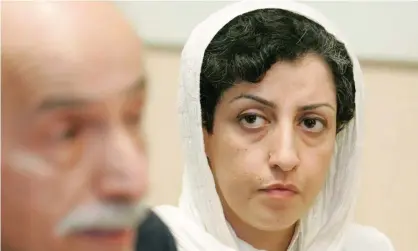  ??  ?? Narges Mohammadi’s husband said she had contracted Covid-19 in prison. Photograph: Magali Girardin/EPA