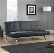  ?? SAUDER VIA AP ?? This undated photo shows Sauder’s armless Cooper sofa, a good option for a tight space where you want furniture with a smaller footprint and room to get around.