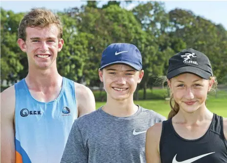  ?? Photo: Nev Madsen ?? READY TO RUN: Toowoomba athletes Jai Gordon (left), Carter Blades and Lilly Hanssen are heading to Sydney next week for the 2018 Australian Junior Athletics Championsh­ip.