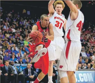  ?? | GETTY IMAGES ?? Ole Miss’ Marshall Henderson started 1-for-11 but finished at 6-for-21.