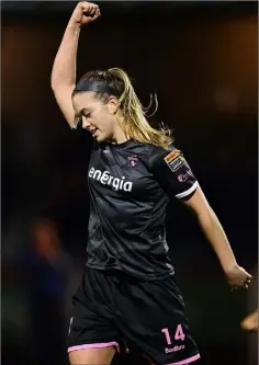  ??  ?? Emma Hansberry celebrates after scoring the second goal.