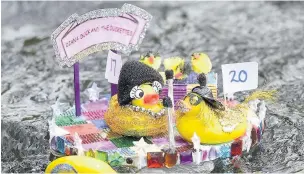 ??  ?? ●● Last year’s event saw more than 80 decorated ducks float down the river