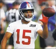  ?? Adam Hunger / Associated Press ?? Giants wide receiver Golden Tate makes a catch during practice in East Rutherford, N.J., on May 20.