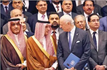  ?? FAYEZ NURELDINE/AFP ?? Saudi Minister of the Arabic Gulf affairs Thamer al-Sabhan (left), Saudi Minister of Foreign Affairs Adel alJubeir (centre) and UN special envoy for Syria crisis Staffan de Mistura pose talk during the Syrian opposition meeting in Riyadh, on November 22.