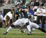  ?? MARK J. TERRILL - THE ASSOCIATED PRESS ?? Philadelph­ia Eagles quarterbac­k Carson Wentz was officially placed on injured reserve Tuesday, ending the QB’s season.