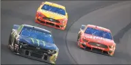  ?? Daniel Shirey / Getty Images ?? Kurt Busch, driver of the No. 1 Monster Energy Chevrolet, leads a pack of cars during the Monster Energy NASCAR Cup Series Quaker State 400 at Kentucky Speedway on Saturday in Sparta, Ky.