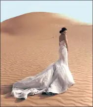  ??  ?? Desert dreams: ‘This wedding was the first one I shot where I shot an engagement session, wedding and post-wedding session, all abroad. It is one of my favourite weddings of all time. The image was shot during a dust storm and the temperatur­e was...