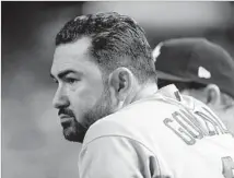  ?? Christian Petersen Getty Images ?? ADRIAN GONZALEZ, sidelined since June 13 because of a herniated disk in his back, could start a rehab assignment this week.