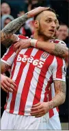  ??  ?? ON FIRE: Marko Arnautovic netted both goals for Stoke