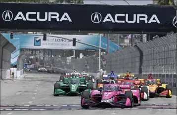  ?? PHOTO BY WILL LESTER ?? IndyCar pole sitter Kyle Kirkwood, 27, leads the field as he takes the green flag to start the 48th Grand Prix of Long Beach.