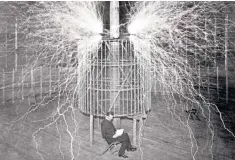  ??  ?? Sparks flying: Tesla with his magnifying transmitte­r in 1899; inset, in 1896