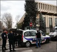  ?? AP/CHRISTOPHE ENA ?? Police officers, some in riot gear, stand outside the Russian Embassy in Paris on Monday.