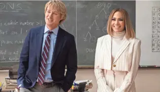  ?? BARRY WETCHER/UNIVERSAL PICTURES VIA AP UNIVERSAL PICTURES VIA AP ?? Owen Wilson, left, is mismatched with Jennifer Lopez in her return to rom-coms “Marry Me.”