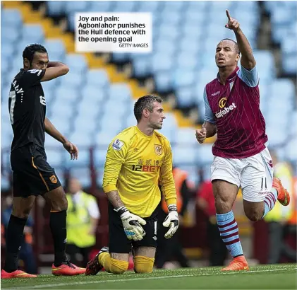  ??  ?? Joy and pain: Agbonlahor punishes the Hull defence with the opening goal