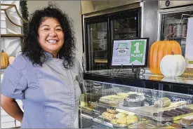  ?? CONTRIBUTE­D BY MARIA SHORT ?? With soaring prices for butter and eggs, Maria Short’s bakery, Short ‘N Sweet, in Hilo, Hawaii, has made its popular bûche de Noël smaller this year despite charging the same price as last year.