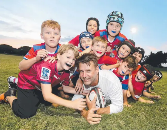  ?? Picture: MIKE BATTERHAM ?? Bond Pirates rugby club’s junior program is through the roof, including the under-9s, pictured with coach Gary Jones.