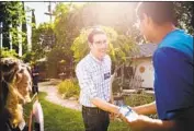  ?? Max Whittaker For The Times ?? JOSH HARDER, a former Silicon Valley venture capitalist, greets voters at a home in Modesto as he bids to represent the 10th Congressio­nal District.