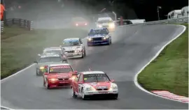  ??  ?? Clockwise from above: Jon Milicevic en route to victory; the Super Touring cars were an evocative sight; Calum Lockie won twice in the March 717