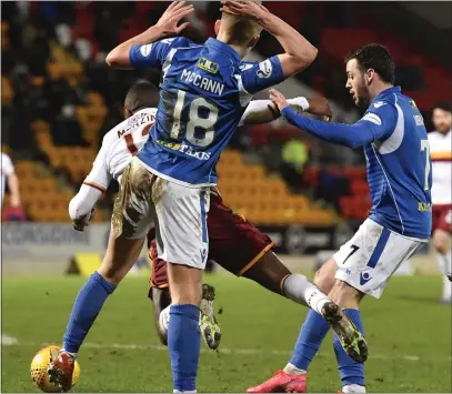  ??  ?? Motherwell’s Christy Manning was booked for simulation and subsequent­ly shown a red card