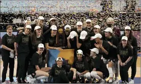  ?? MORRY GASH — THE ASSOCIATED PRESS ?? Stanford players celebrate with the trophy after the championsh­ip game against Arizona in the women’s Final Four NCAA college basketball tournament, Sunday, April 4, 2021, at the Alamodome in San Antonio. Stanford won 54-53.