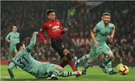  ??  ?? Jesse Lingard scores Manchester United’s second goal as they equalise for a second time against Arsenal at Old Trafford. Photograph: Oli Scarff/AFP/Getty Images