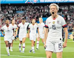  ??  ?? Centre stage: Megan Rapinoe celebrates the goal that knocked out hosts France