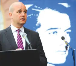  ?? (Scanpix Sweden/Reuters) ?? THEN-SWEDISH prime minister Fredrik Reinfeldt speaks during the inaugurati­on of a memorial marking the centennial of Raoul Wallenberg’s birth, outside the Foreign Ministry in Stockholm, in 2012.