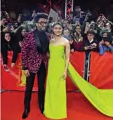  ??  ?? Indian Bolywood actor Ranveer Singh and British actress Alia Bhatt pose on the red carpet before the premiere of the film “Gully boy” presented in the special gala section at the 69th Berlinale film festival in Berlin. — AFP photos