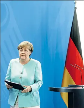  ?? ?? German Chancellor Angela Merkel leaves a podium in 2016