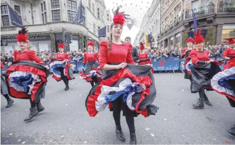  ?? — AFP ?? Participan­ts take part in the annual New Year’s Day Parade in central London, on Monday.