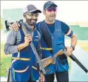  ?? BIPLOV BHUYAN/HT ?? Angad Bajwa (L) and Mairaj Khan after winning gold and silver medals in skeet at National Shotgun Championsh­ips.