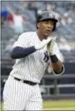  ?? BILL KOSTROUN — THE ASSOCIATED PRESS ?? Yankees’ Miguel Andujar reacts as he rounds the bases after hitting a tworun home run during the seventh inning.