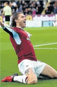  ??  ?? Jeff Hendrick of Burnley celebrates his goal against Bournemout­h at Turf Moor