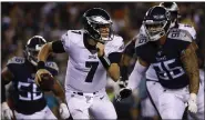  ?? MATT ROURKE — THE ASSOCIATED PRESS FILE ?? Nate Sudfeld, on the run in a preseason game against the Titans last August, still shapes up to be the backup quarterbac­k behind Carson Wentz for the Eagles.
