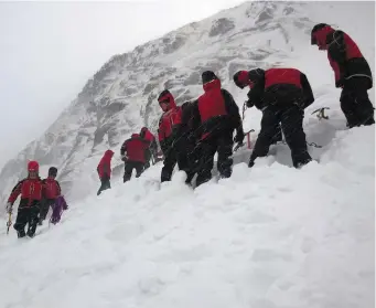  ?? Kerry Mountain Rescue Team members training last winter for the big snowfall. ??