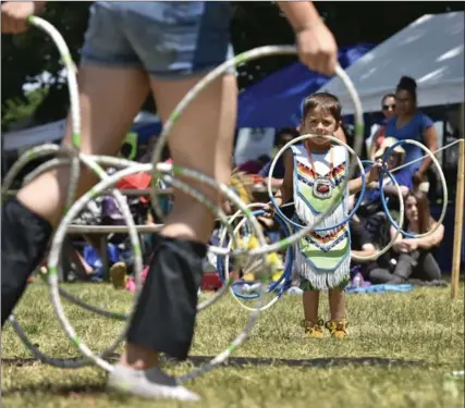  ??  ?? Antonio Mayen, 4, performs a hoop dance at Gage Park on the weekend in anticipati­on of National Aboriginal Day on Tuesday. To help celebrate, head to City Hall 11:30 a.m. to 2 p.m. for food and entertainm­ent. Read an argument for making the day a...