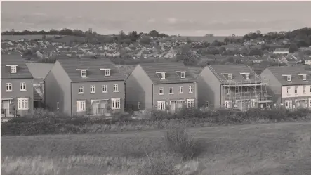  ?? ?? The government has proposed to build 300,000 homes a year, but—according to Labour’s Lucy Powell—it is short on a plan to achieve that