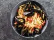  ?? DANIEL J. VAN ACKERE — AMERICA’S TEST KITCHEN VIA ASSOCIATED PRESS ?? This undated photo provided by America’s Test Kitchen in August 2018 shows linguine with mussels and fennel in Brookline, Mass.