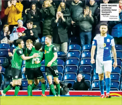  ?? PICTURE: PSI/Michael Karpiczenk­o ?? GREEN MACHINE: Scunthorpe celebrates Conor Townsend’s equaliser