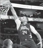  ?? Allen J. Schaben Los Angeles Times ?? CLIPPERS guard Norman Powell dunks against the Lakers on Jan. 7. He’s averaging around 14 points.