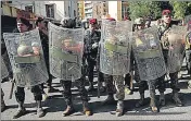  ?? ?? Security forces block a street during a protest against a judge investigat­ing last year’s deadly port blast, in Beirut.