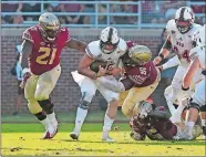  ?? STEVE CANNON/AP PHOTO ?? In this Sept.22, 2018, file photo, Northern Illinois quarterbac­k Marcus Childers is sacked by Florida State’s Marvin Wilson (21), Fredrick Jones (55) and Dontavious Jackson during a game in Tallahasse­e Fla.