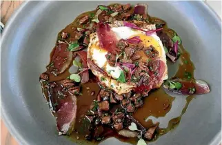  ??  ?? The duck prosciutto with duck heart sauce, potato rosti and free-range fried egg.
