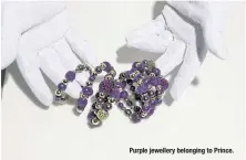  ??  ?? Purple jewellery belonging to Prince.