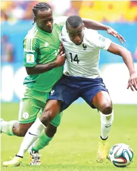  ??  ?? Victor Moses of Nigeria challenges Blaise Matuidi of France during the 2014 FIFA World Cup Brazil Round of 16 match. France won 2-0