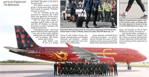  ?? (AFP) ?? Members of Belgium’s national men’s and women’s football teams pose near the new Brussels Airlines Belgian Icon “Trident” plane, featuring both team’s nicknames – Red Devils and Belgian Red Flames – at the Zaventem airport, on Tuesday, before the team’s departure to Kuwait on their way to the FIFA 2022 World Cup in Qatar.