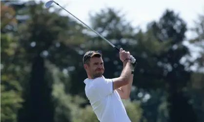  ?? Photograph: Tony
Marshall/Getty Images for PCA ?? Jimmy Anderson on the first tee at Stoke Poges during an England golf day earlier this week. Not all went smoothly.